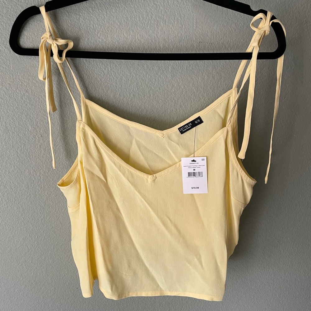 Yellow top, ties on shoulders